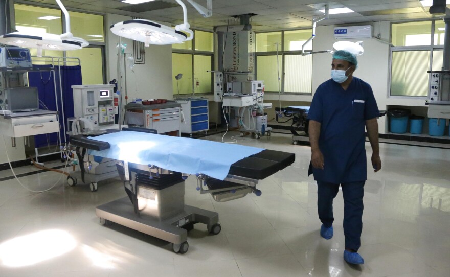 A newly-opened COVID-19 hospital in Kabul. Dr. Wahid Majrooh, the acting minister of public health in Afghanistan, must address the pandemic's toll at a time when the Taliban takeover has triggered a freeze in hundreds of millions of dollars in health-care aid from outside groups.