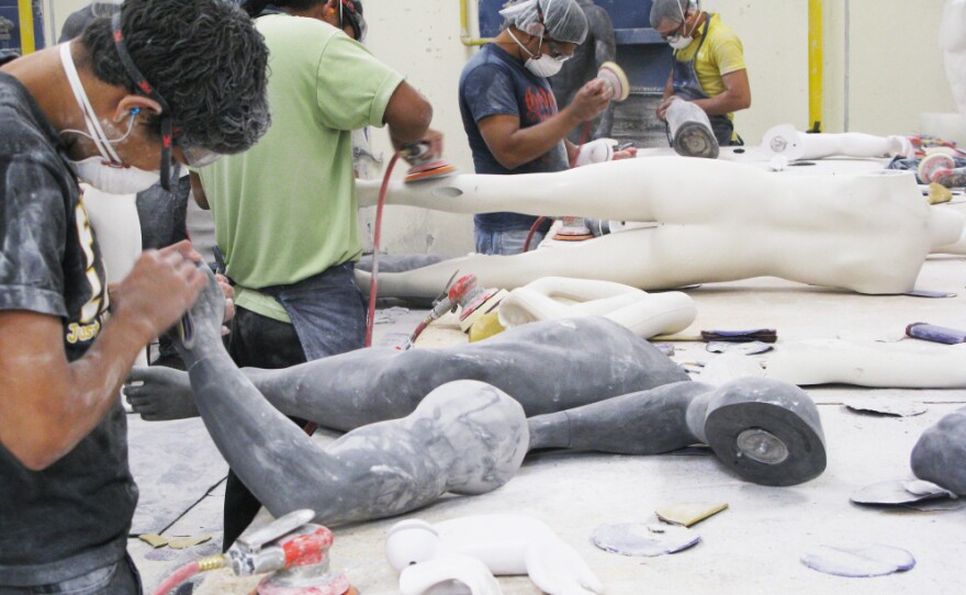 Workers at a <em>maquiladora</em> assembly plant in Juarez, across the border from El Paso, Texas, make mannequins. While other parts of Mexico are moving slowly out of the recent recession, the <em>maquiladoras</em> have been rapidly adding jobs and boosting exports to record levels.