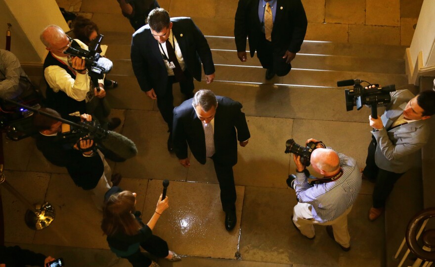 Speaker of the House John Boehner arrives at the Capitol on Saturday.