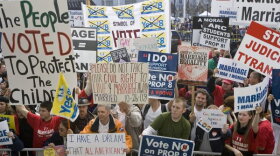 People rally in front of the California Supreme Court Building after arguments were heard for and against Proposition 8 March 5, 2009 in San Francisco, California. 