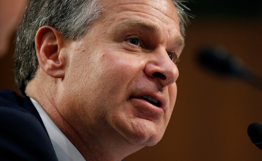 FBI Director Christopher Wray testifies on Capitol Hill on June 18.