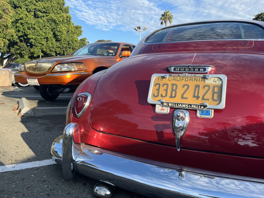 Marisa Rosales car nicknamed "Christine" is parked next to other lowriders in National City's Kimball Park, Oct. 19, 2023.