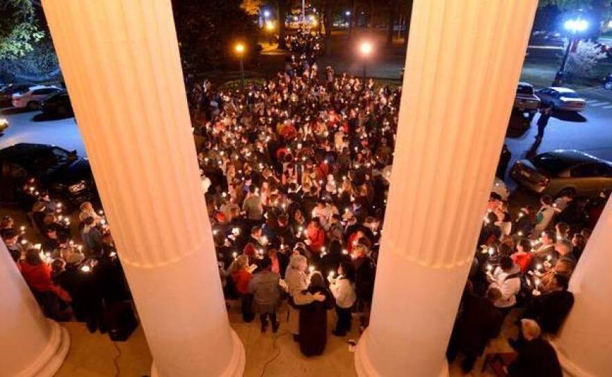 Students at Ole Miss responded to the Nov. 6 rally with a candlelight walk the following evening.