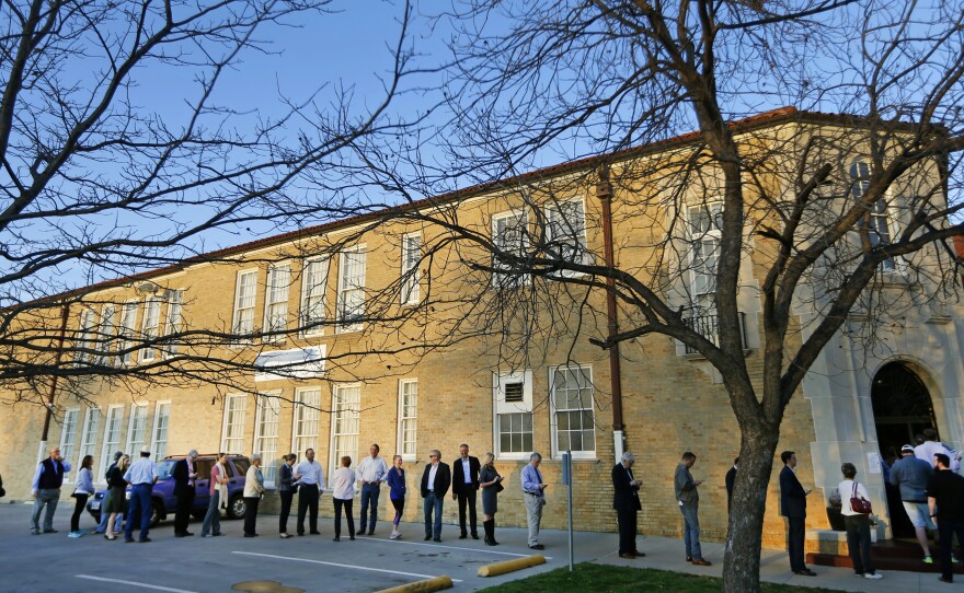 Voters line up to cast their ballots on Super Tuesday, March 1, in Fort Worth, Texas.