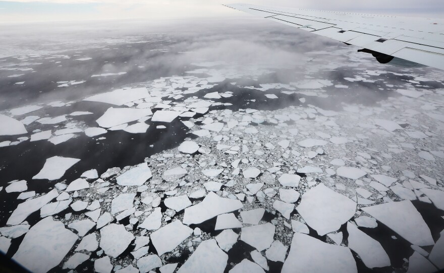 Exposed ocean water absorbs more heat than ice does, which then makes it more difficult for ice to re-form.