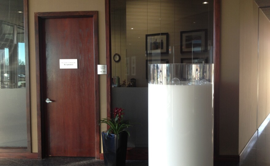 This 5-foot plexiglass piece of art resembling a freshly poured glass of milk sits near the door at Dairy Farmers of America headquarters in Kansas City, Mo.