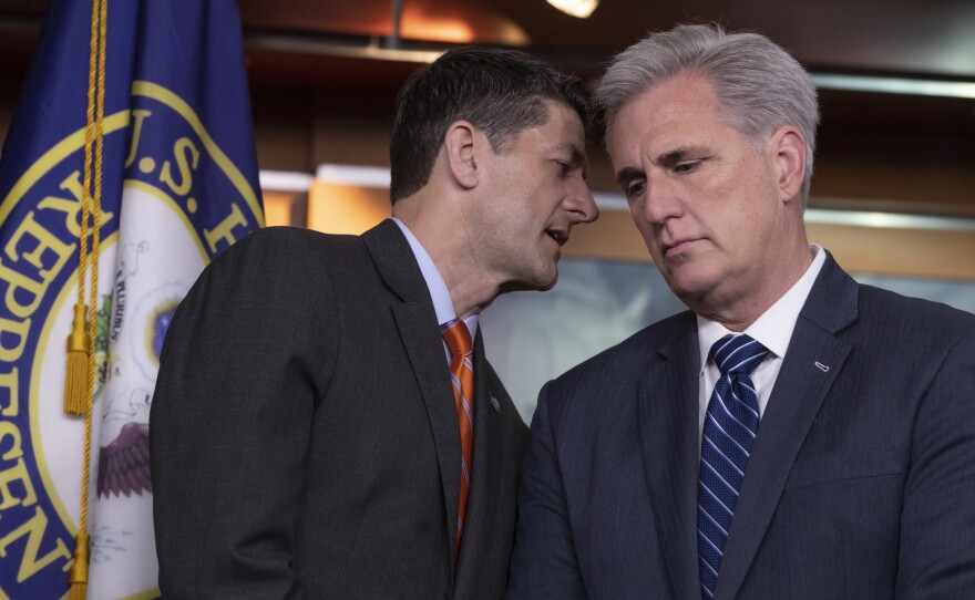 Speaker of the House Paul Ryan, R-Wis., confers with House Majority Leader Kevin McCarthy, R-Calif., during a news conference on Capitol Hill on Wednesday.