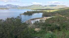 Water spills over the Lower Otay Reservoir dam, Feb. 28, 2017. 
