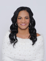 Woman smiling with white sweater