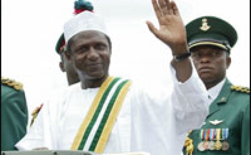 Nigeria's President Umaru Yar'Adua waves to the crowd following a swearing-in ceremony at Eagles Square in Abuja on May 29.