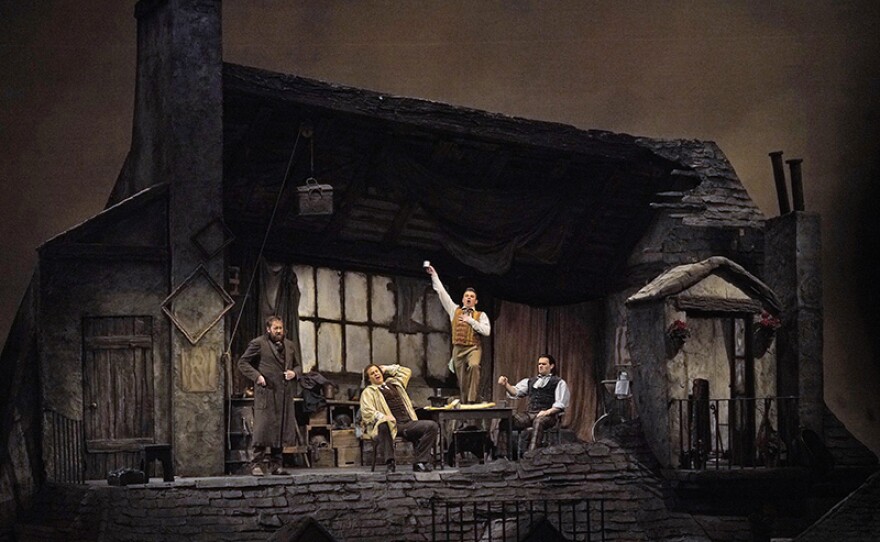 A scene from Act I of Puccini’s “La Bohème.”