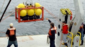Researchers in the Scripps Whale Acoustic Lab deploy a high-frequency acoustic recording package designed to record marine mammal sounds.