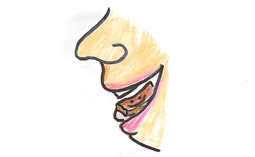 Illustration of a person's open mouth with a piece of chocolate on their tongue.