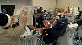 San Diego Blood Bank employees assist blood donors with their donations on July 23, 2025 at the Manchester Grand Hyatt. San Diego, Calif.