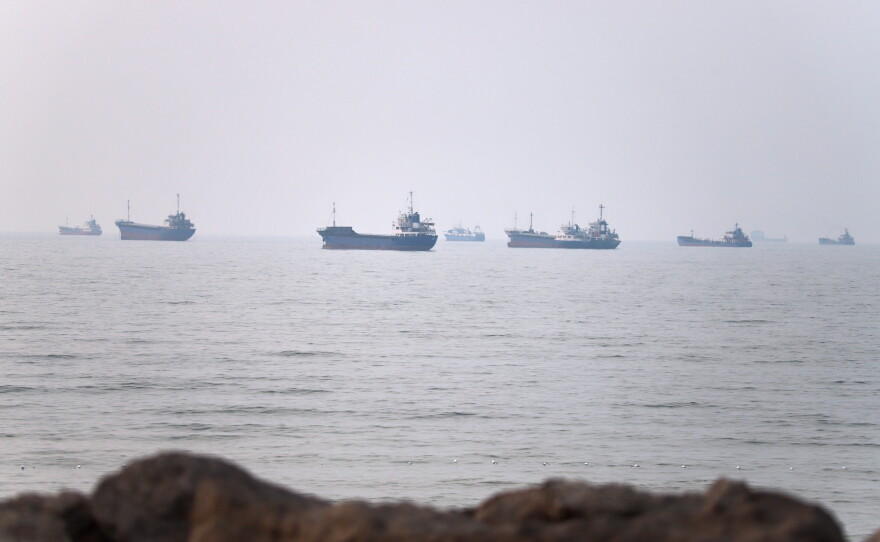 Commercial vessels are seen in the Strait of Hormuz off Bandar Abbas, Iran, Tuesday, June 30, 2026.