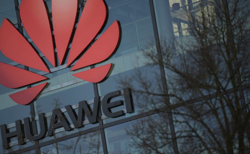 The U.S. is "disappointed" by the U.K.'s decision to allow Huawei to be part of its 5G network, a senior Trump administration official told NPR.