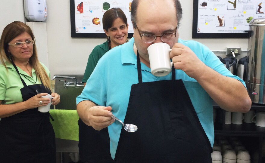 Alfredo Rodriguez, a Puerto Rican coffee farmer and certified taster, teaches a class on the art of cupping — how to taste and discern the quality of coffee.