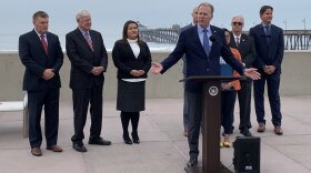 San Diego Mayor Kevin Faulconer flanked by Port of San Diego Commissioner Dan Malcolm, county Supervisor Greg Cox, San Diego City Councilwoman Vivian Moreno and Imperial Beach Mayor Serge Dedina (far right) at a news conference introducing a resolution Dec. 3, 2019, calling for federal action to stop the cross-border sewage flows in the Tijuana River Valley. 
