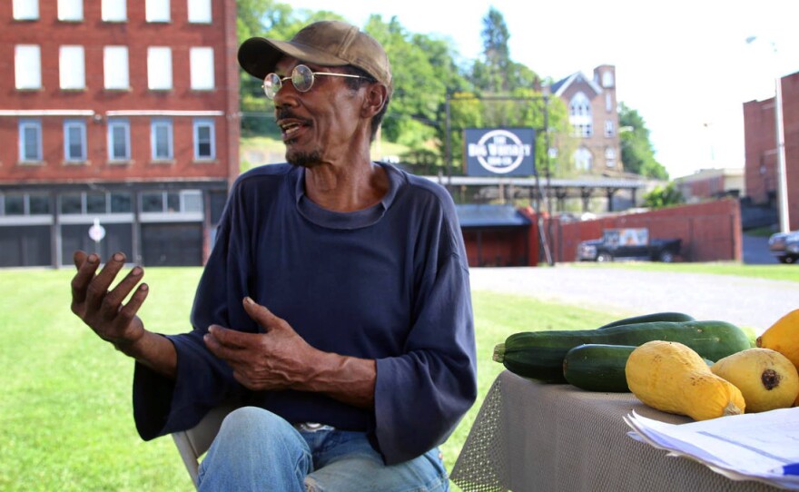 Farmer Sky Edwards has tried to start a farmers market in McDowell County, W.Va., but so far it hasn't been successful. So he travels 60 miles round trip each week to sell vegetables in Bluefield, W.Va., where residents have more cash to spend on groceries.