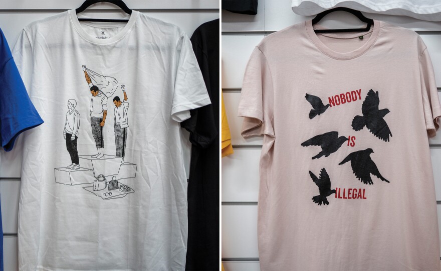 T-shirts at the Pantera store depict anti-racist scenes and slogans.