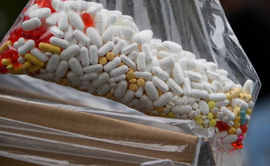 A bag of assorted pills and prescription drugs dropped off for disposal is displayed during the Drug Enforcement Administration's 20th National Prescription Drug Take Back Day earlier this year in Los Angeles. According to the Centers for Disease Control and Prevention, more than  100,000 people died of a drug overdose from April 2020 to April 2021.