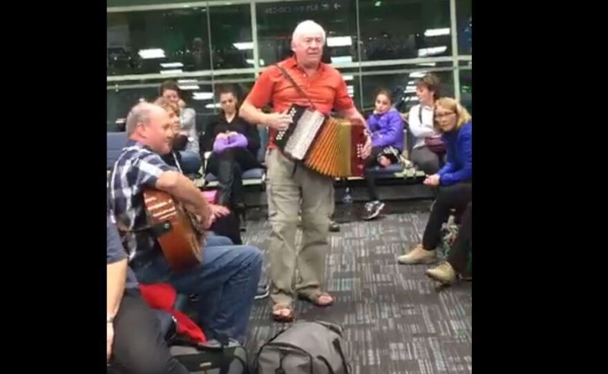 WATCH: Their Flight Was Delayed. So, They Broke Out An Accordion And Partied