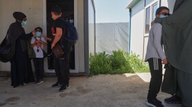 Members of Australian families at Roj Camp in eastern Syria, housing people with alleged ties to Islamic State militants, prepare to leave for Damascus as part of a second repatriation effort by Syrian authorities, Friday, April 24, 2026.