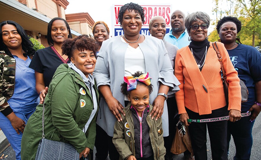 Georgia’s Stacey Abrams (center) campaigns to become America’s first black woman governor.