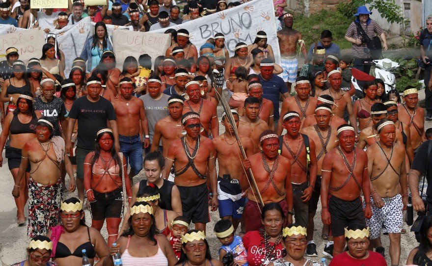 Indigenous people march to protest against the disappearance of Indigenous expert Bruno Pereira and freelance British journalist Dom Phillips, in Atalaia do Norte, Vale do Javari, Amazonas state, Brazil, Monday.