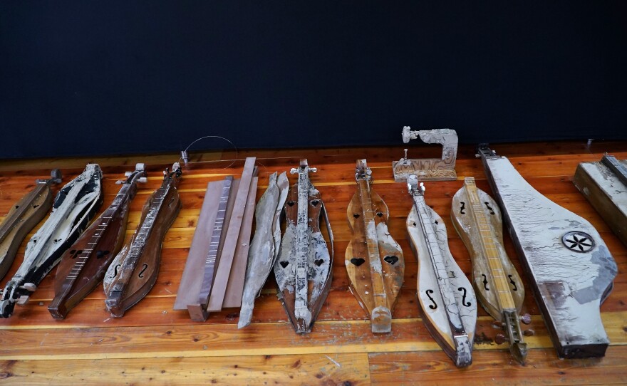 Damaged instruments from the Museum of the Mountain Dulcimer line the upper floor of Hindman's Appalachian Artisan Center.