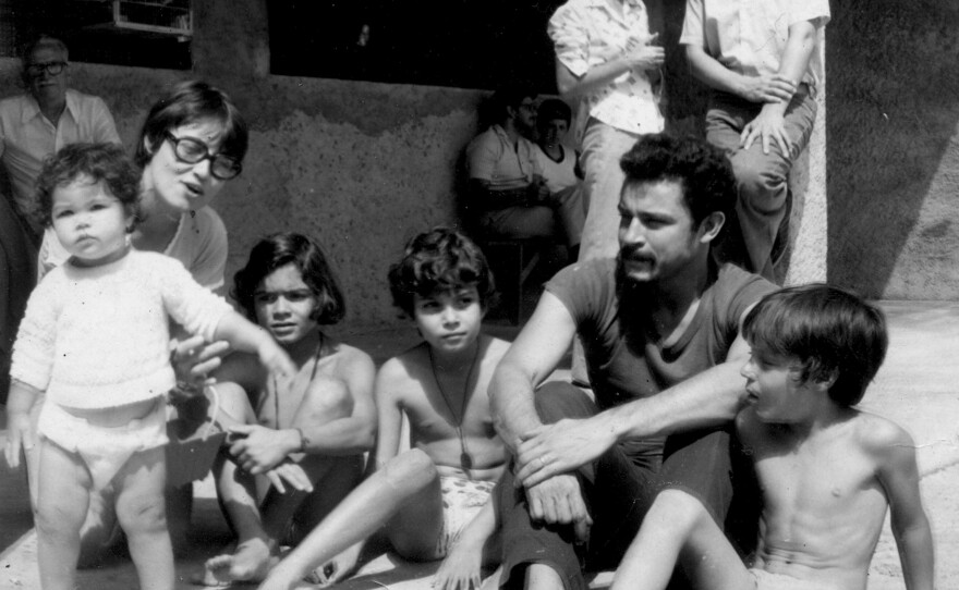 Maria Amelia Teles (left) sits with her husband Cesar Teles and their two children in Sao Paulo in the 1970s. She was tortured; her children were brought in to see her after she was beaten. She is calling for the amnesty law, which protects those responsible, to be revoked.