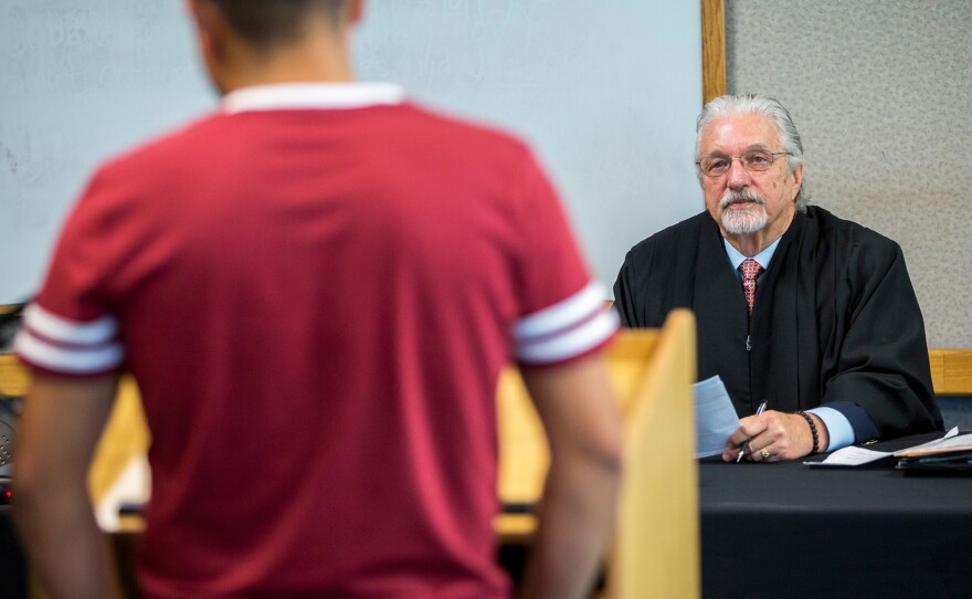 Hearing Officer Jim Teal presides over a session of Early Intervention Family Drug Court in Sacramento, Calif., in March. The county program helps keep families together — and saves taxpayers $7 million annually, Sacramento County officials say.