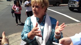 Judi Winslow, part owner of the Sofia Hotel, says plans for a rapid bus station on her block of Broadway will force them to close an outdoor dining area. 