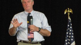 Rep. Brian Baird answers questions at a town hall meeting at the Clark County Amphitheater in southwestern Washington state.
