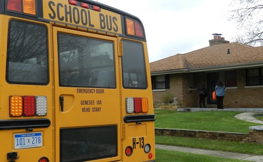 Teachers and volunteers canvas house to house recruiting children for early education programs, which may help offset damage from the lead-contaminated water.