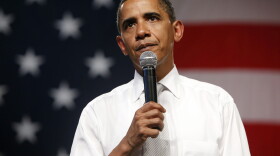 President Obama speaks during a town hall meeting on health care in Shaker Heights, Ohio, on Thursday. Findings from a recent NPR poll indicate that about half of Americans are now onboard with Obama's health care plan.