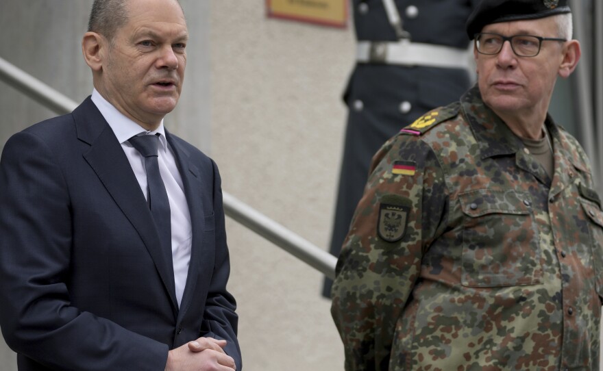 German Chancellor Olaf Scholz speaks as he arrives for a visit of the Joint Operations Command of the German armed forces in Schwielowsee near Berlin, March 4.