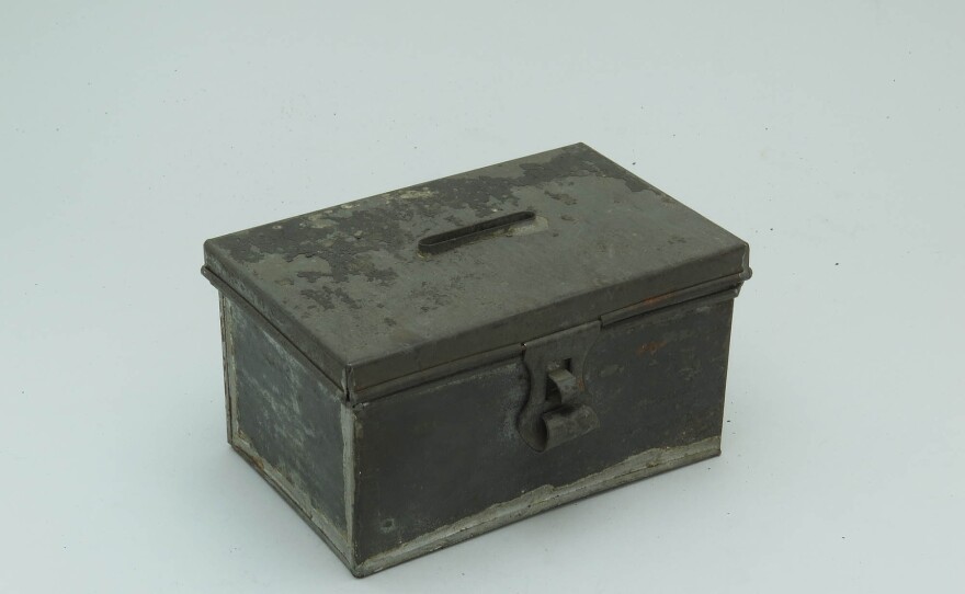 These early 19th century alms boxes were used to collect money for religious institutions and charities.