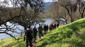 The Sonoma Ecology Center is hosting "Fire Walks" through burned areas around Sonoma County. In this undated picture, people walk along a trail in Sonoma. 