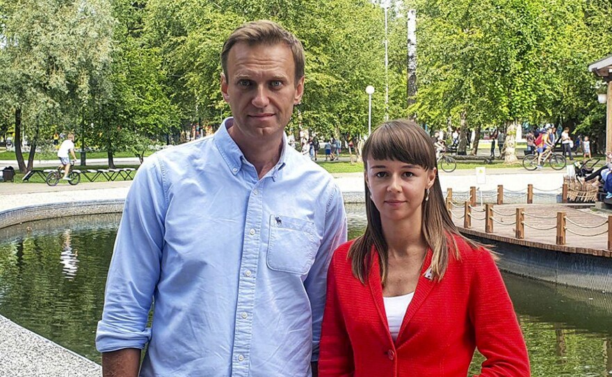 In this August photo, Alexei Navalny poses for a photo with Siberian politician Ksenia Fadeyeva. Navalny was removed from a medically-induced coma in a Berlin hospital after suffering what German authorities say was a poisoning with a chemical nerve agent while traveling in Siberia in August.