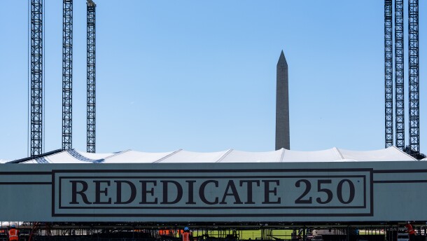 Work continues on the stage for the Rededicate 250 celebration on the National Mall in Washington.