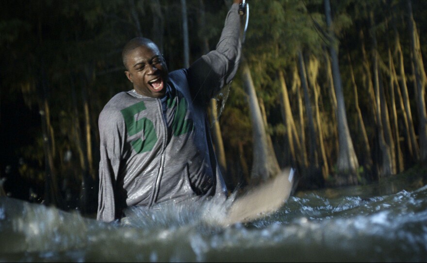 Sinqua Walls as the film's token black in "Shark Night 3D."