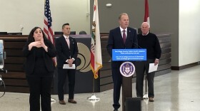 San Diego Mayor Kevin Faulcon (center) announcing a relief fund at City Hall in downtown San Diego for small businesses affected by the coronavirus crisis, March 18, 2020.