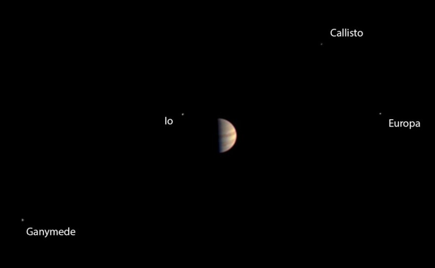 Before turning all of its attention to an orbit insertion at Jupiter, the Juno craft took this image of its target planet and surrounding moons.