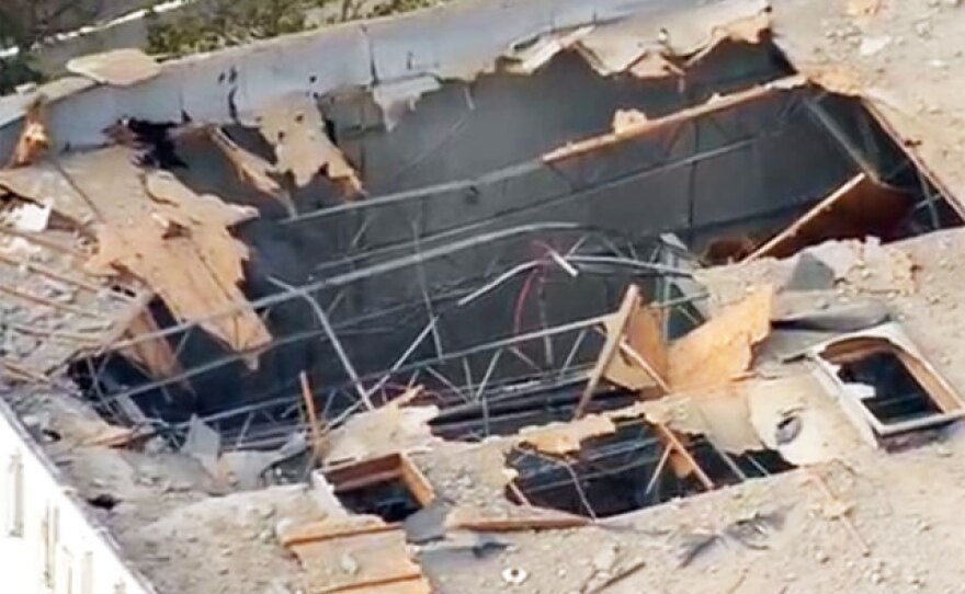 An explosion damaged the roof of the Quantum Energy Storage building in Poway, June 10, 2015.