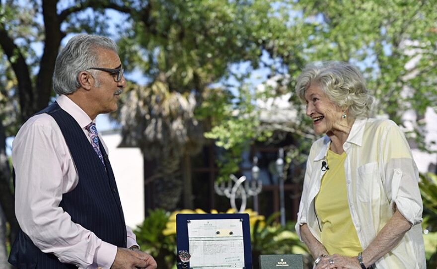 Kevin Zavian (right) appraises a 1963 Rolex GMT Master at McNay Art Museum in San Antonio, Texas.