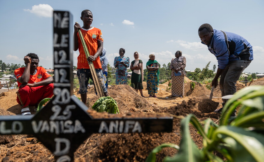Relatives of Vanisa Anifa, a 6-month-old orphaned girl who died of Ebola, attend her burial, in Bunia, Congo, Friday, June 19, 2026.