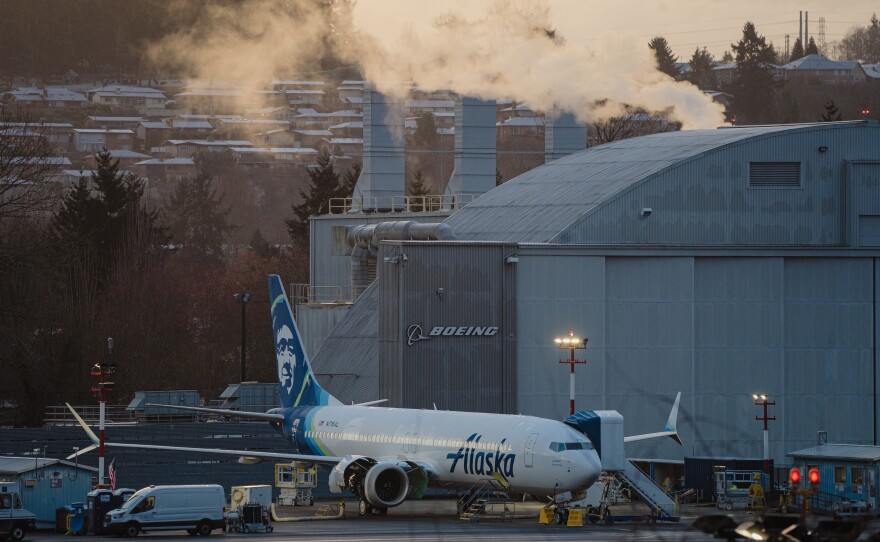 Boeing workers at the Renton Municipal Airport in Washington finalize assembly of an Alaska Airlines Boeing 737 Max jet on Feb. 27. An FAA audit faulted Boeing for "multiple instances" of quality control shortcomings.