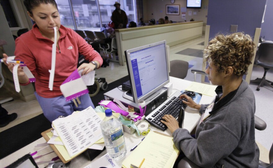 Triage nurses work to admit and to screen patients in the emergency waiting room of the University of Chicago Medical Center. The nursing profession kept hiring even during the recession.