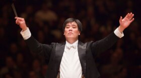 Conductor Alan Gilbert leads the New York Philharmonic during a special Carnegie Hall 120th anniversary concert.